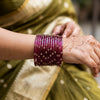 ANML - Wine Red Glass Bangle Set with Gold Ghungroo Latkan Kadas