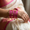 ANML - Pink Glass Bangle Set with Gold Ghungroo Latkan Kadas