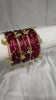 ANML - Wine Red Glass Bangle Set with Gold Ghungroo Latkan Kadas