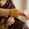 ANML - Mustard Haldi Glass Bangle Set with Gold Stone Work Haldi Ceremony Churi