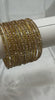 GlitB - Gold Glitter Glass Bangle Set with Champagne Gold Stone Work
